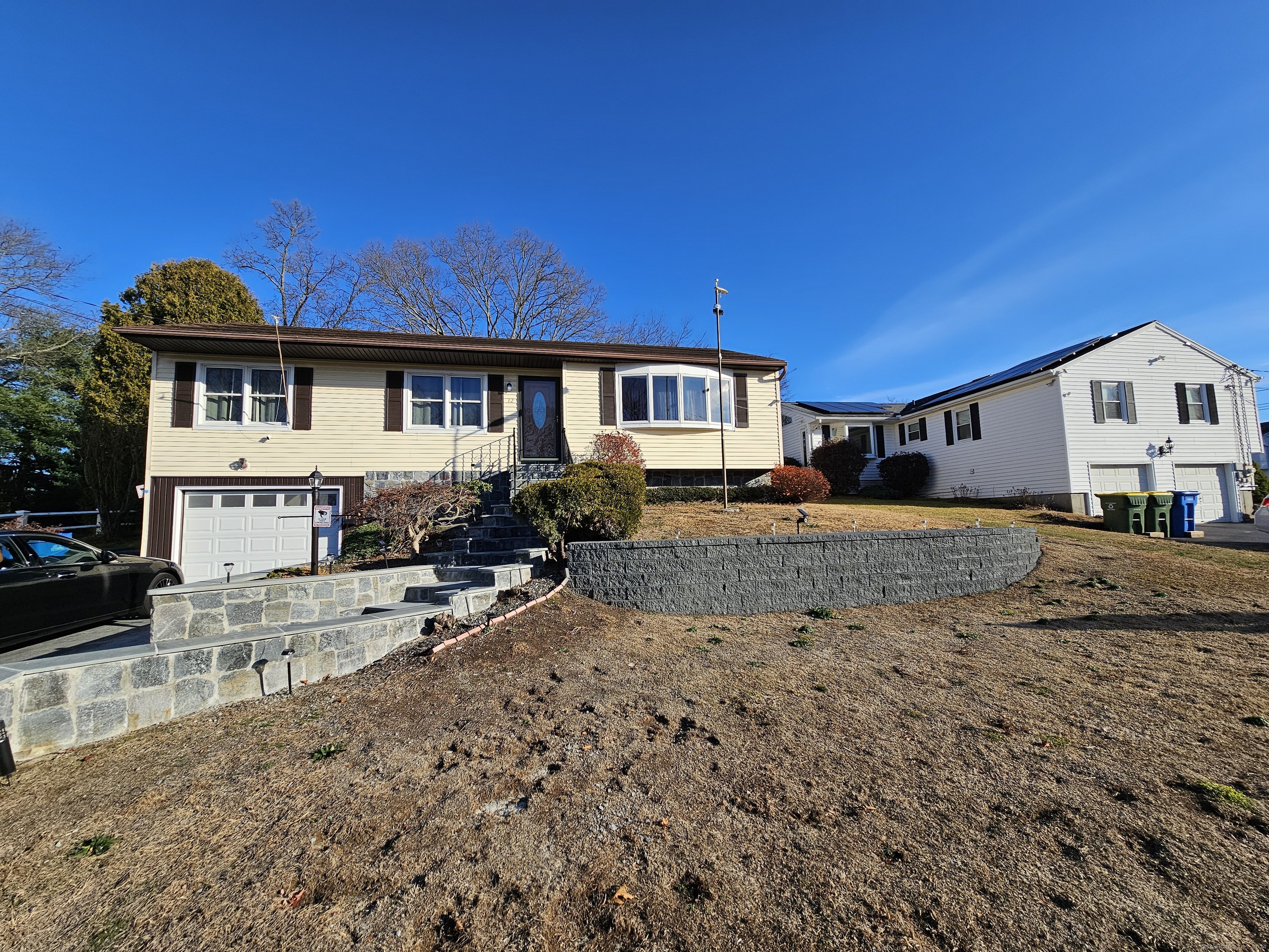 a view of a house with a patio