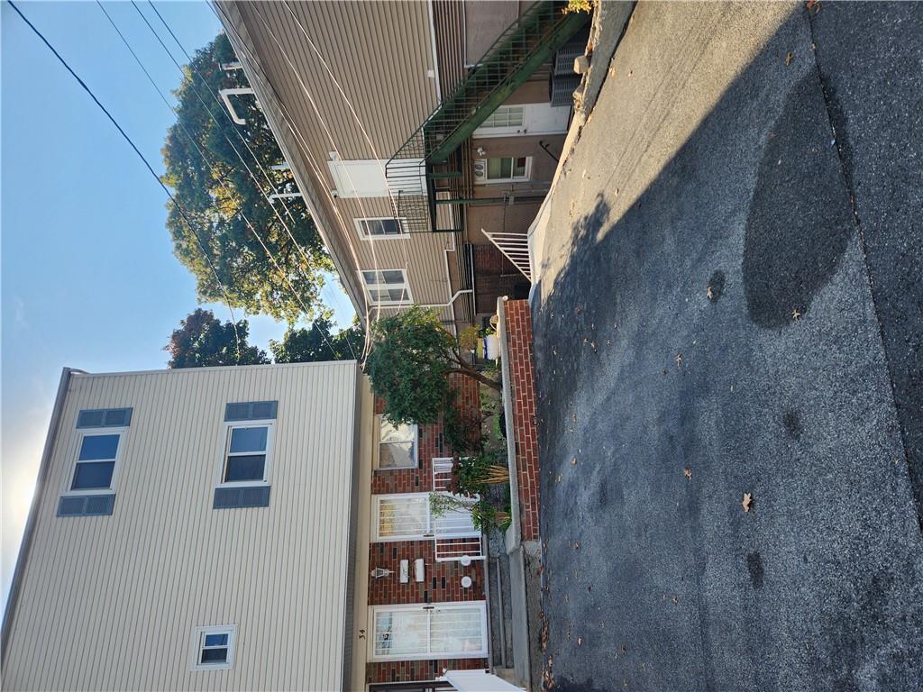 a view of a house with a street