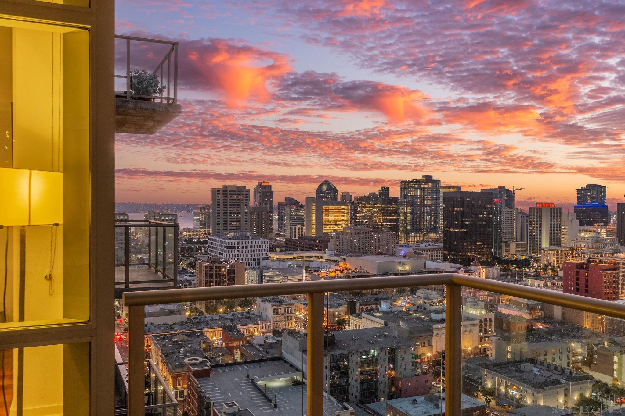 a view of a balcony with city view