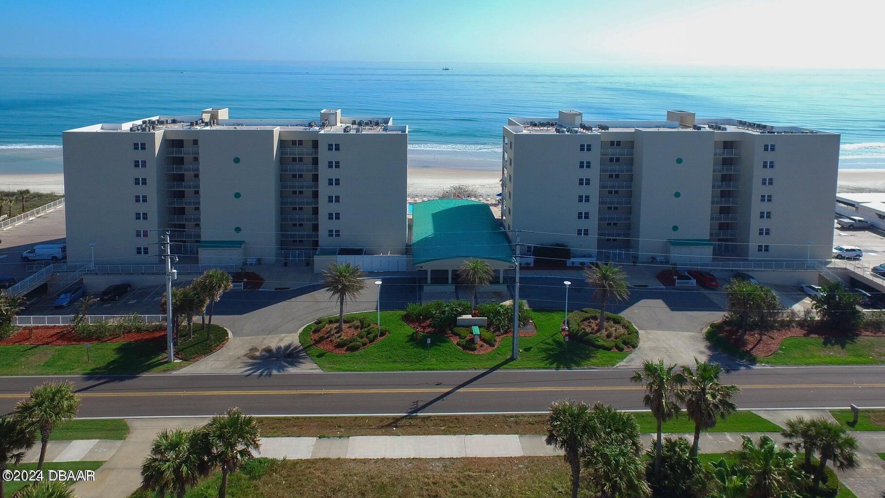 an aerial view of buildings with outdoor space