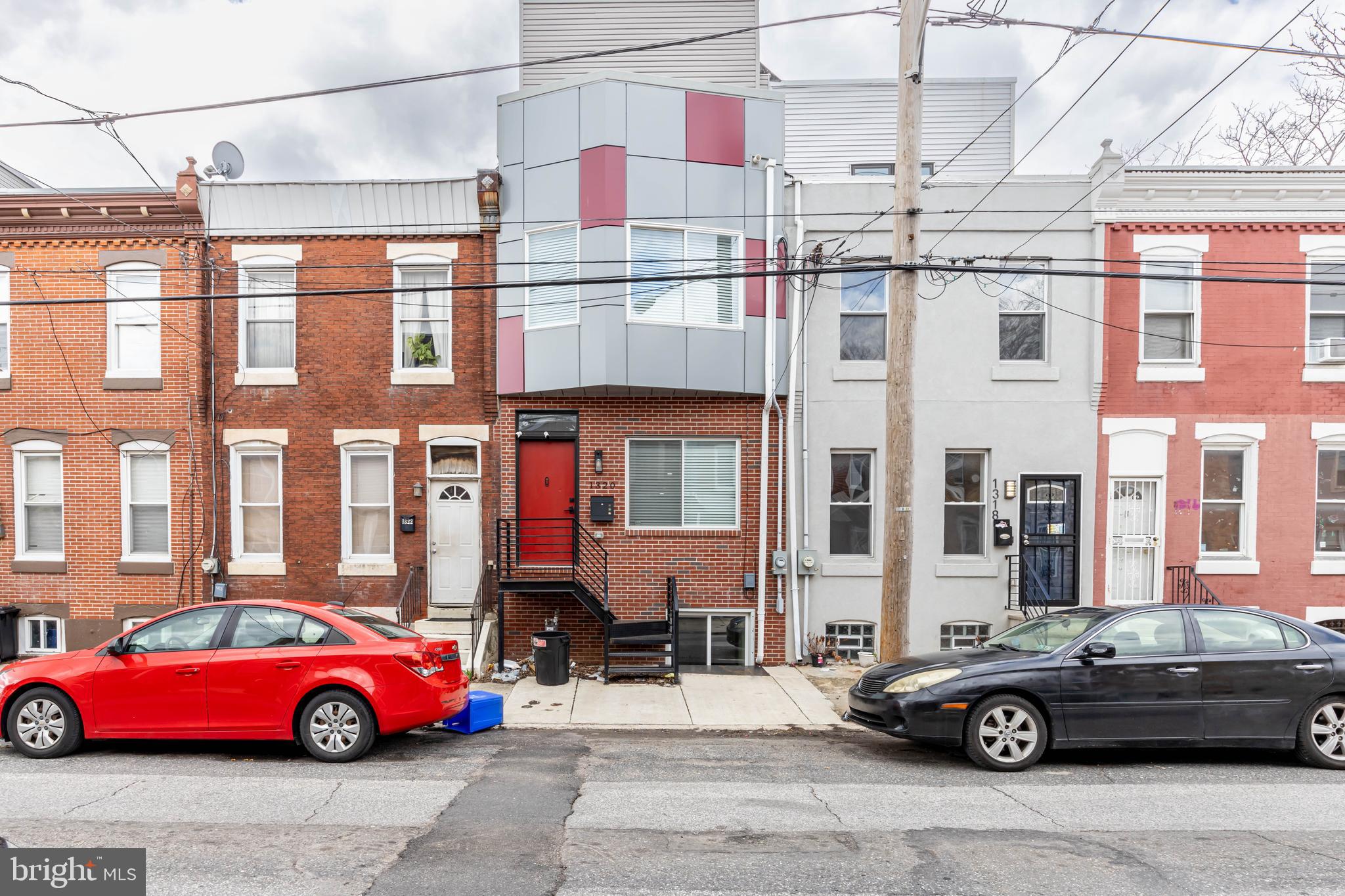 a cars parked in front of a building