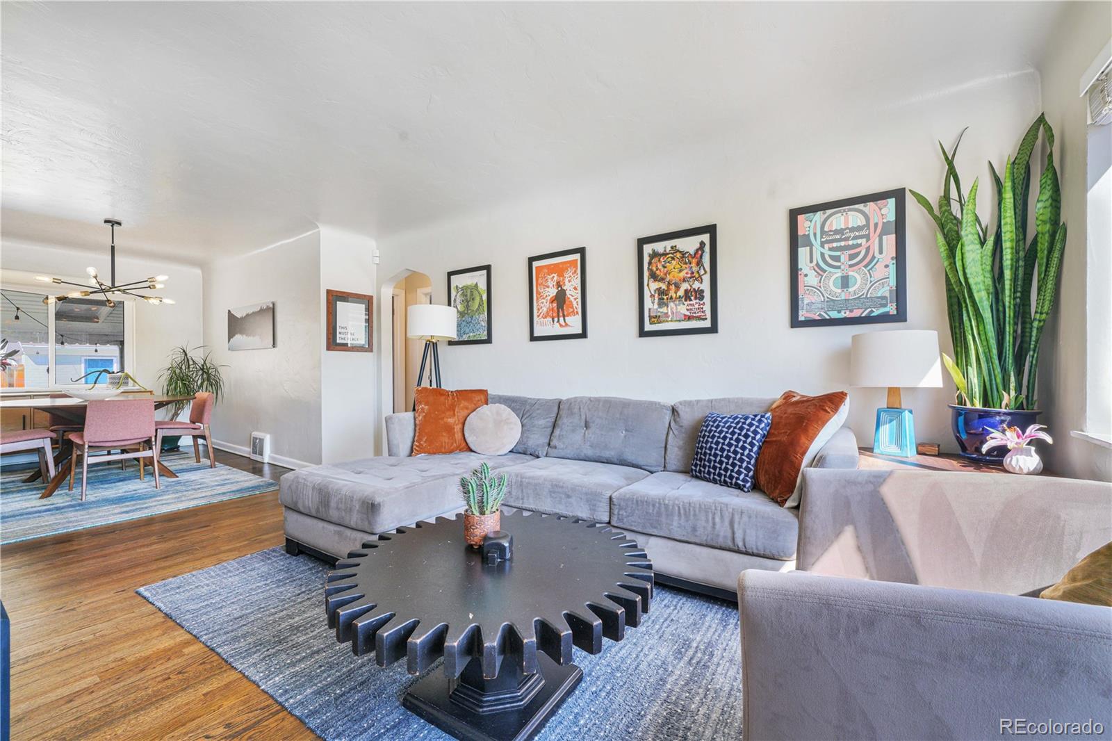 a living room with furniture and a couch