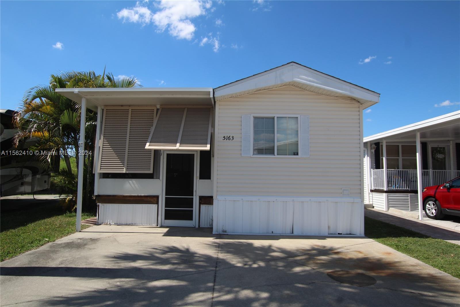 a view of a house with a garage and a garage