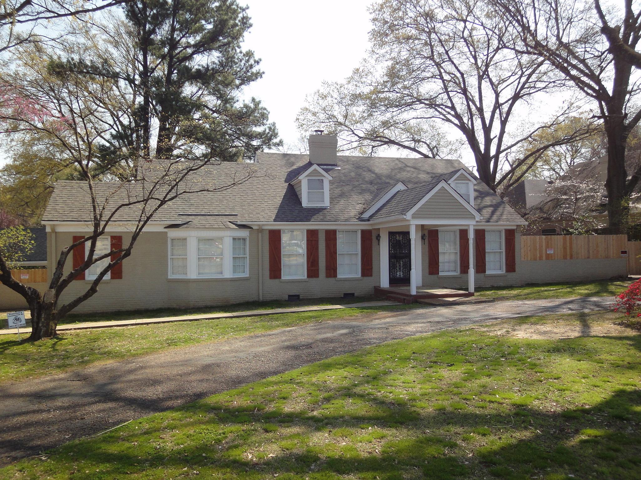 View of front of property with a front lawn