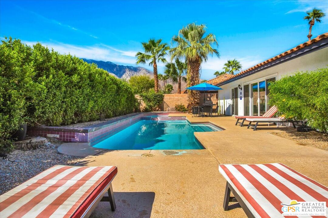 a view of a backyard with a patio