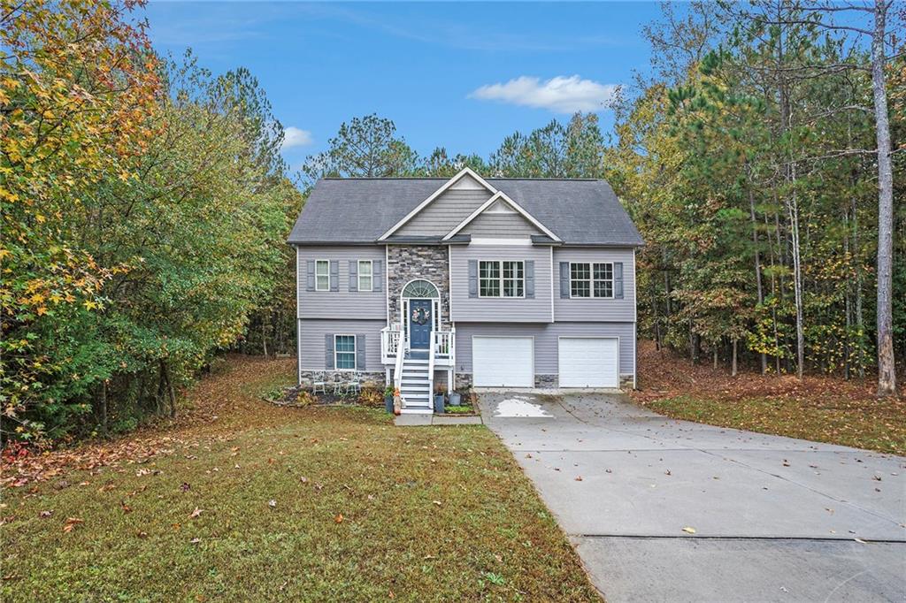 front view of a house with a yard