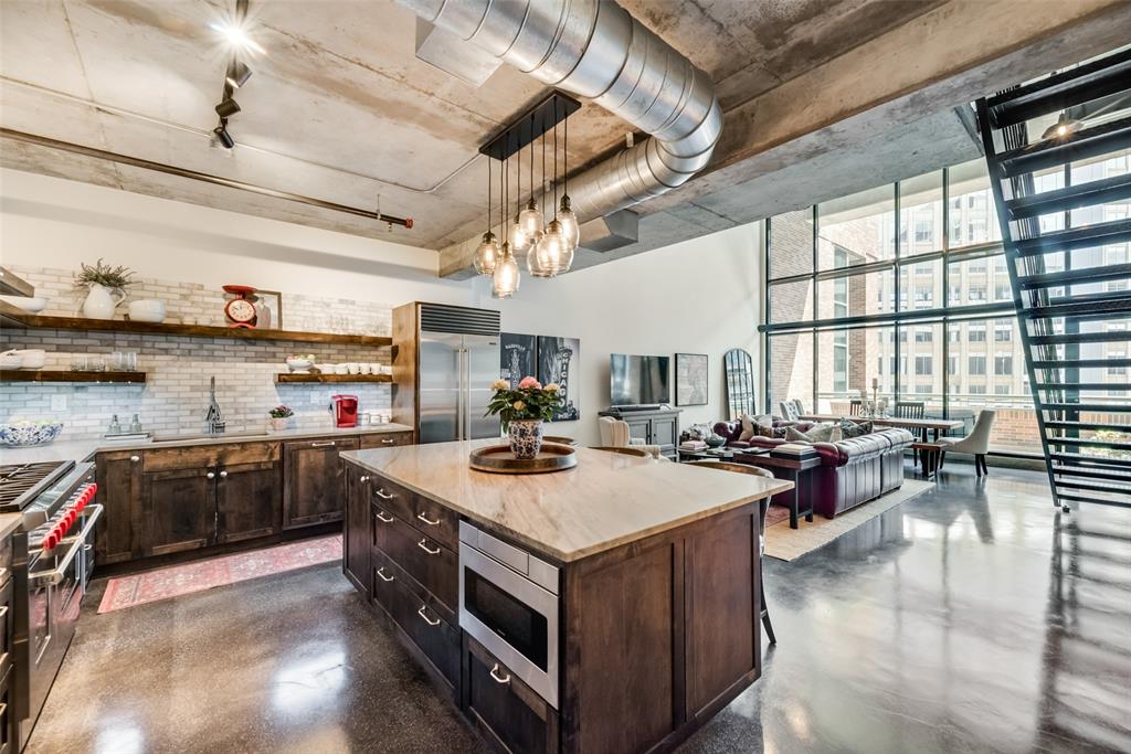 a kitchen with a stove and a refrigerator