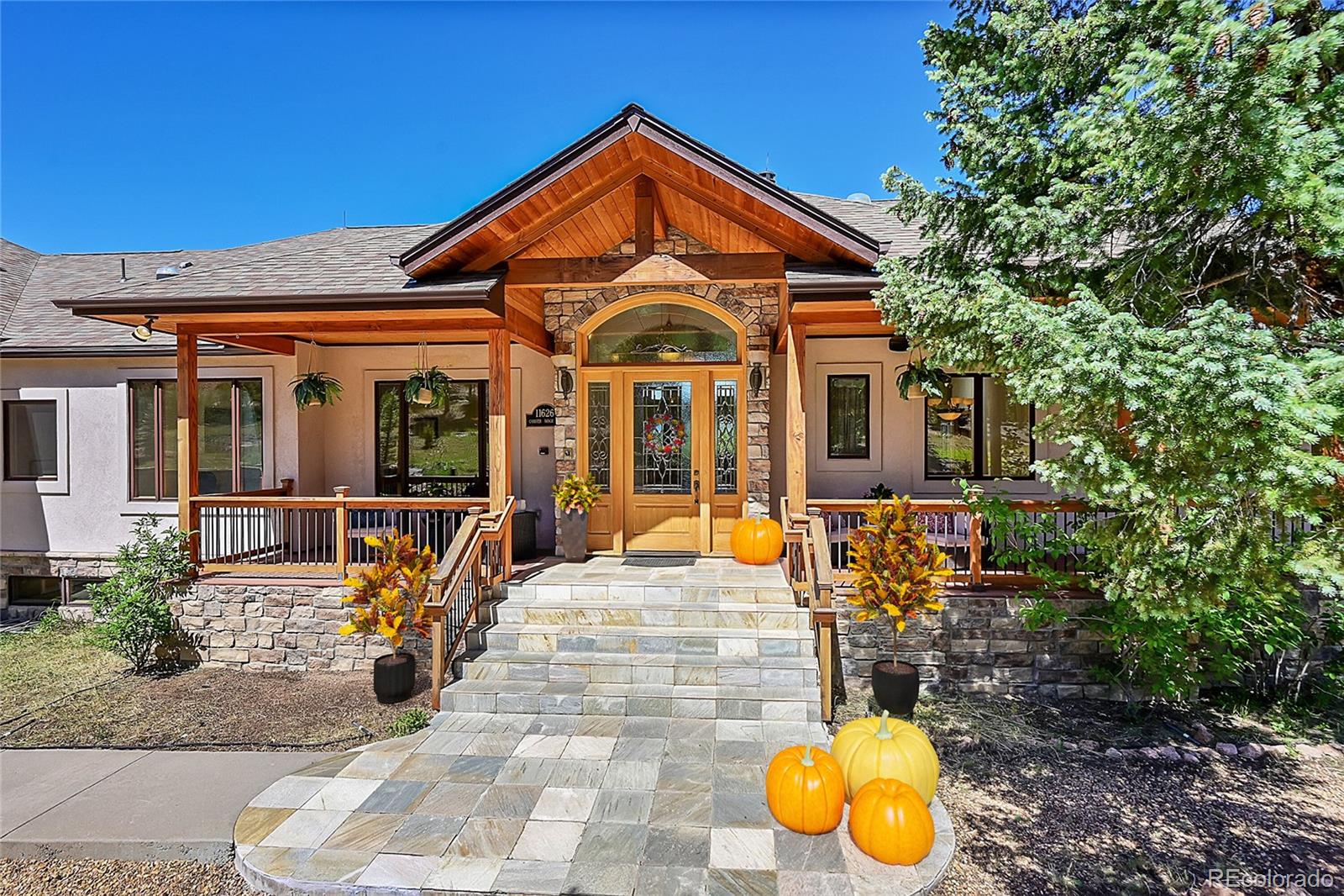 a front view of a house with patio