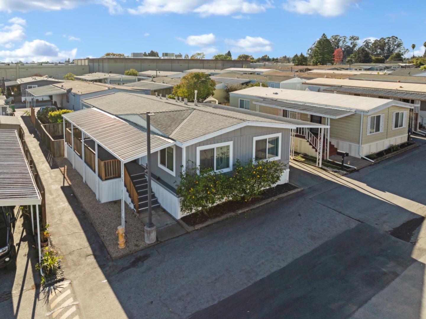 an aerial view of a house with a big yard