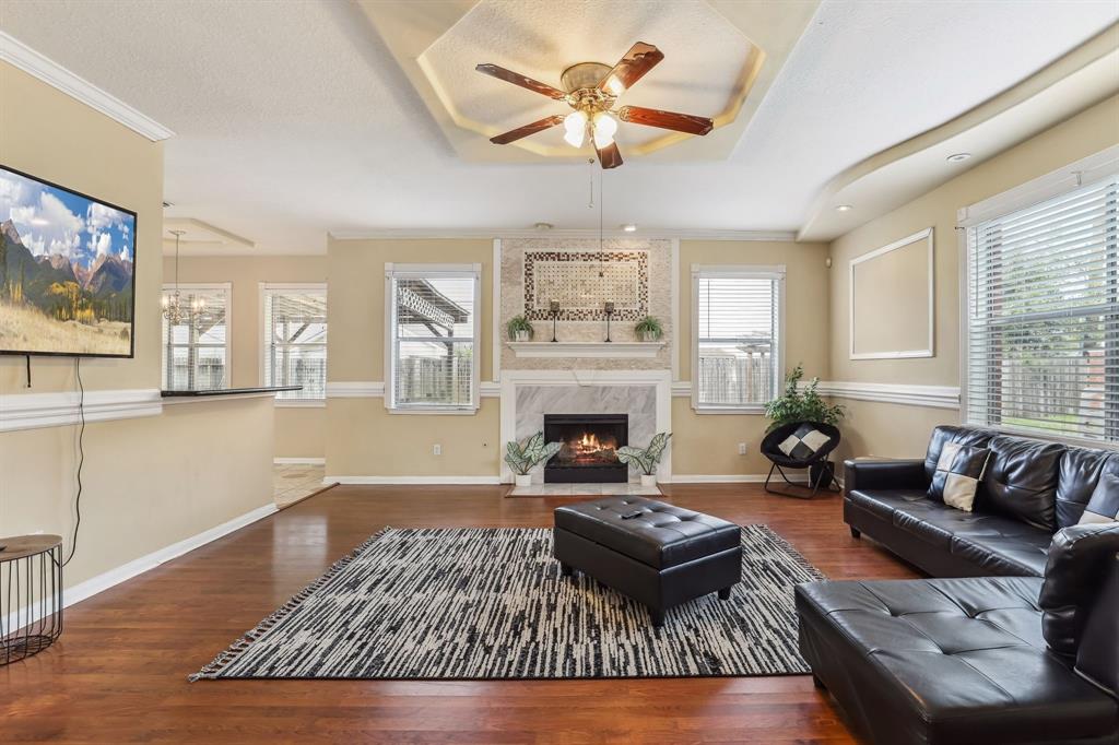 a living room with furniture rug and window