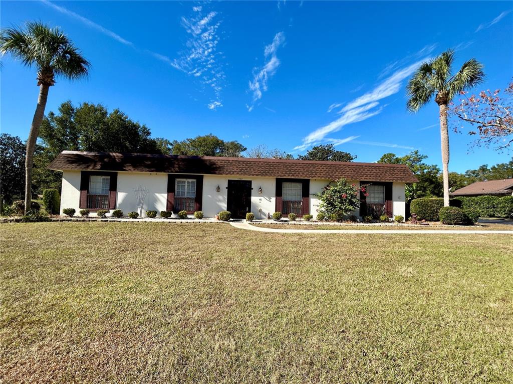 a front view of a house with patio