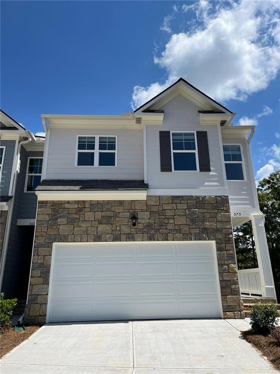 a front view of house with yard