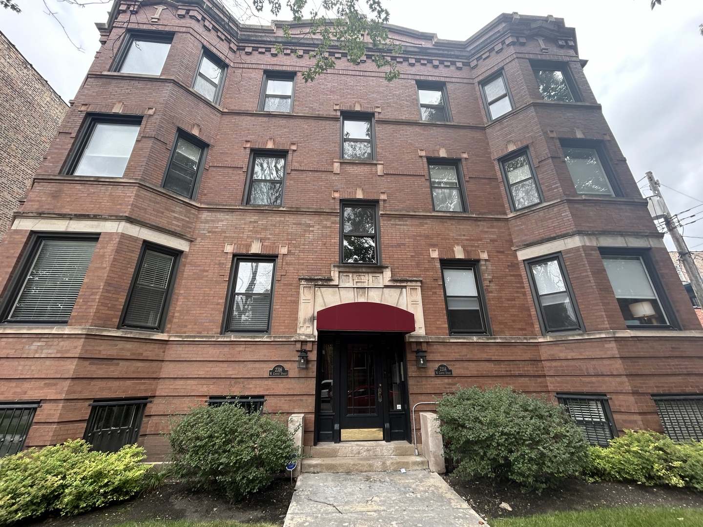 a front view of a multi story residential apartment building