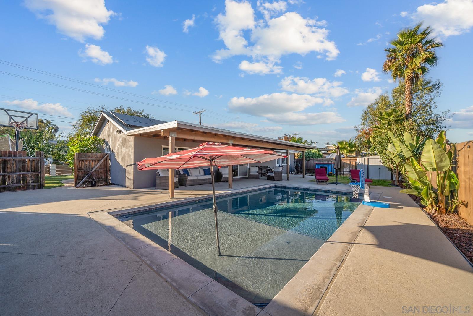 a view of a house with a swimming pool