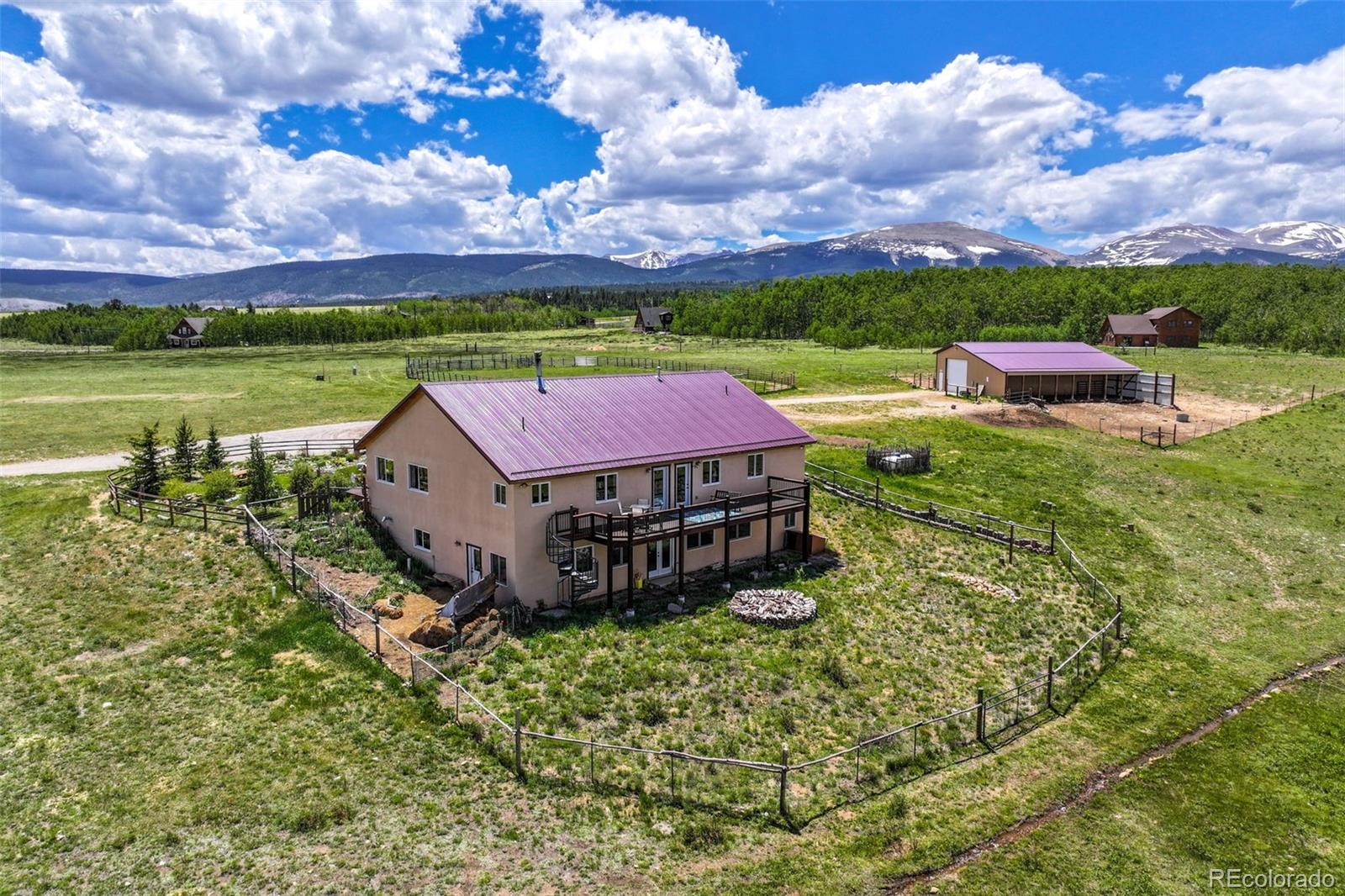 a aerial view of a house with a yard