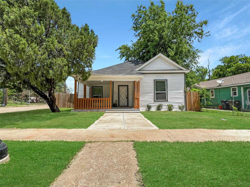 front view of a house and a yard