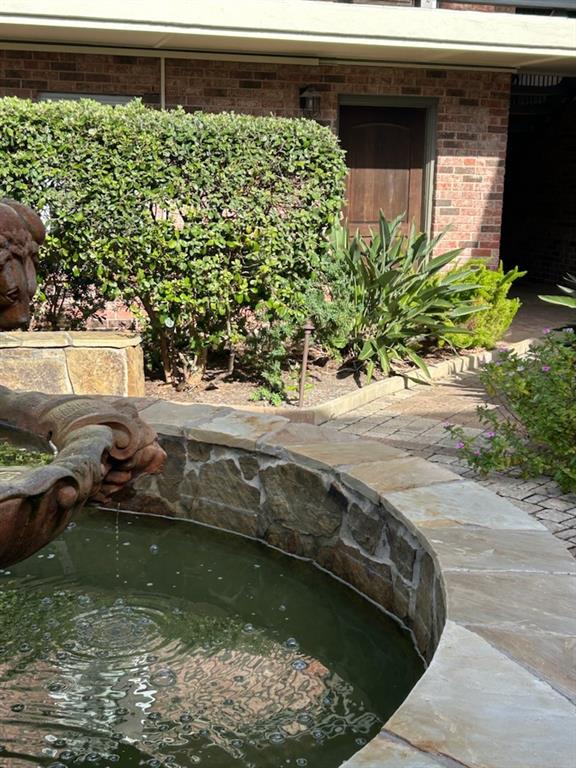 a view of swimming pool from a outdoor space