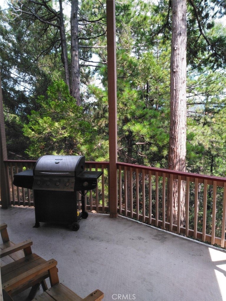 a view of a two chairs in the roof deck