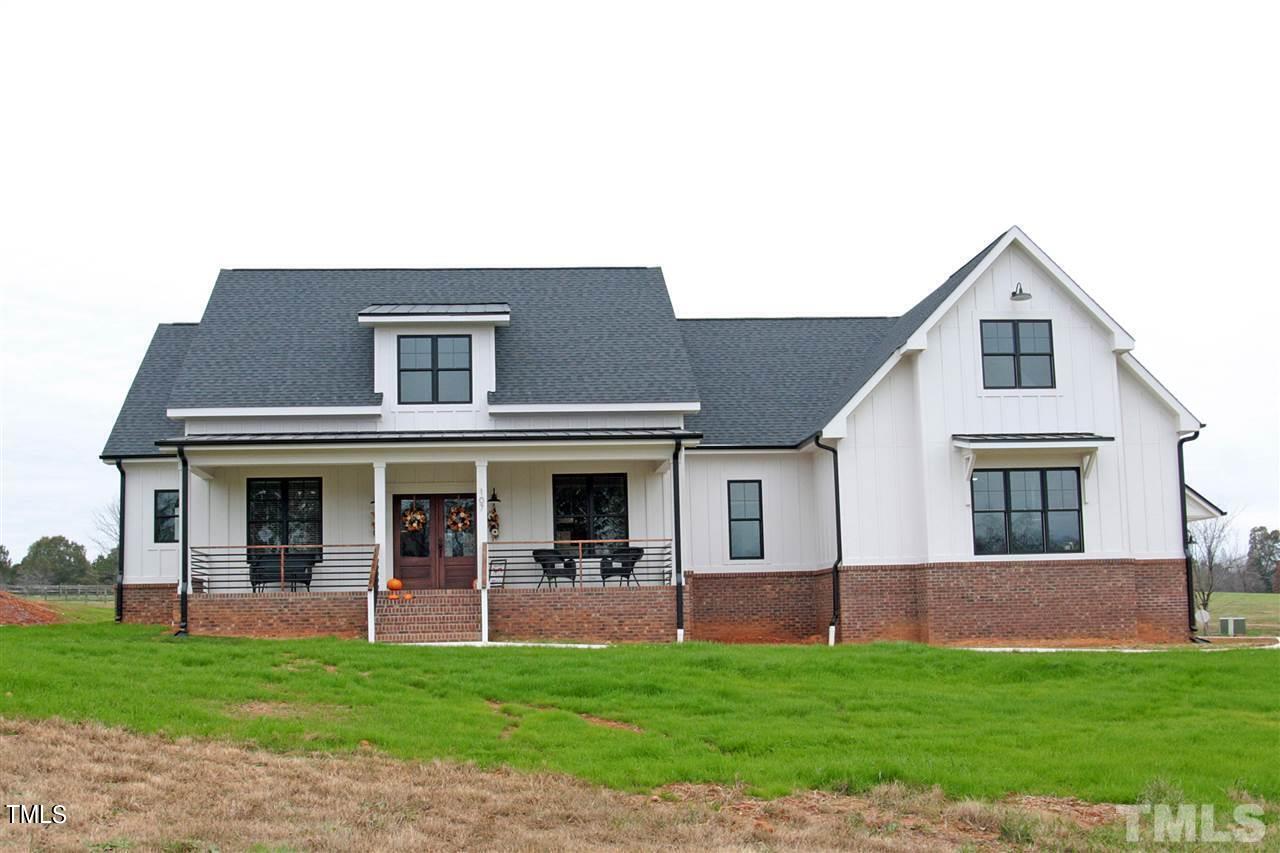 a house view with a garden space