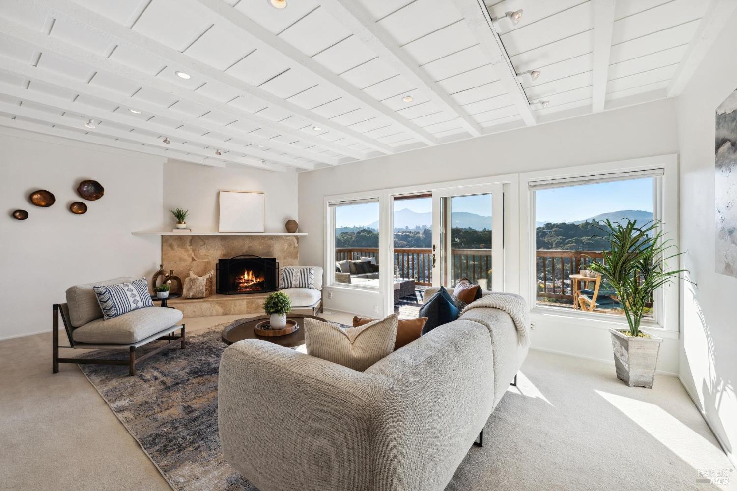 Living room on entrance/main floor with outstanding Mt. Tam views, sun throughout the day and glorious sunsets