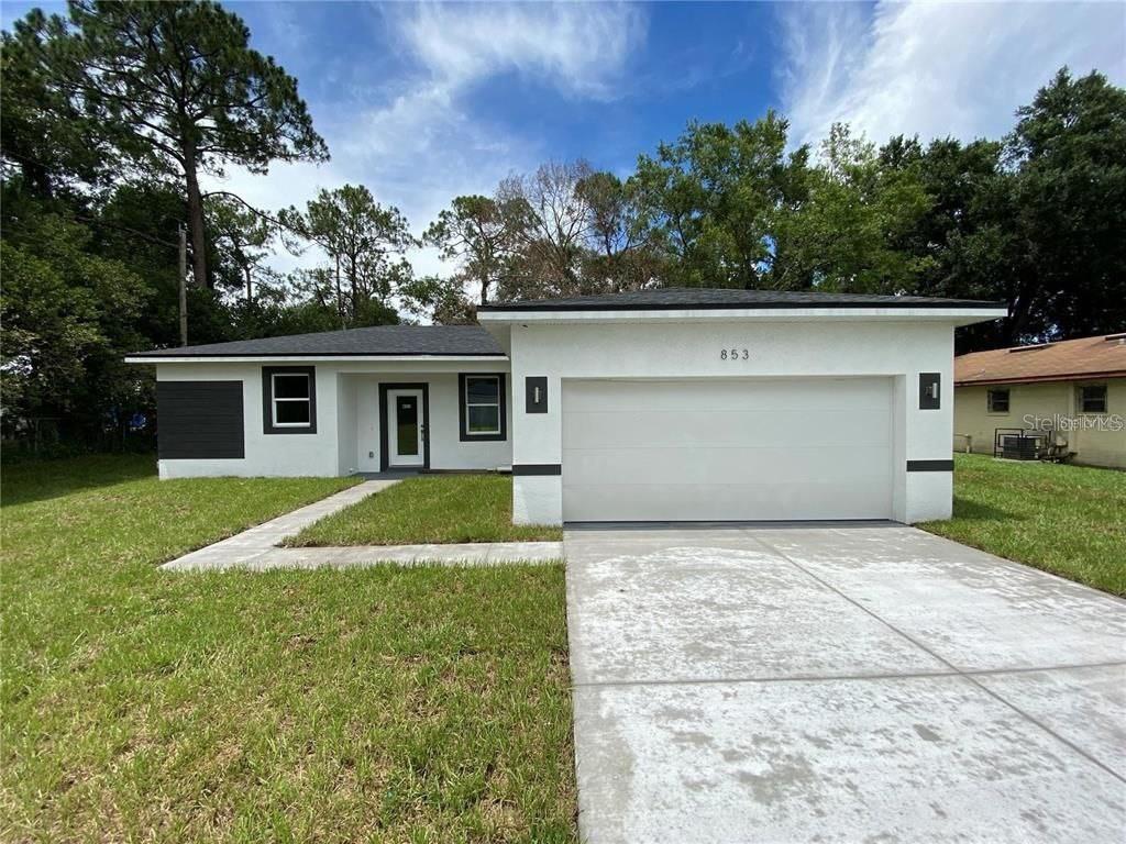 front view of house with a yard