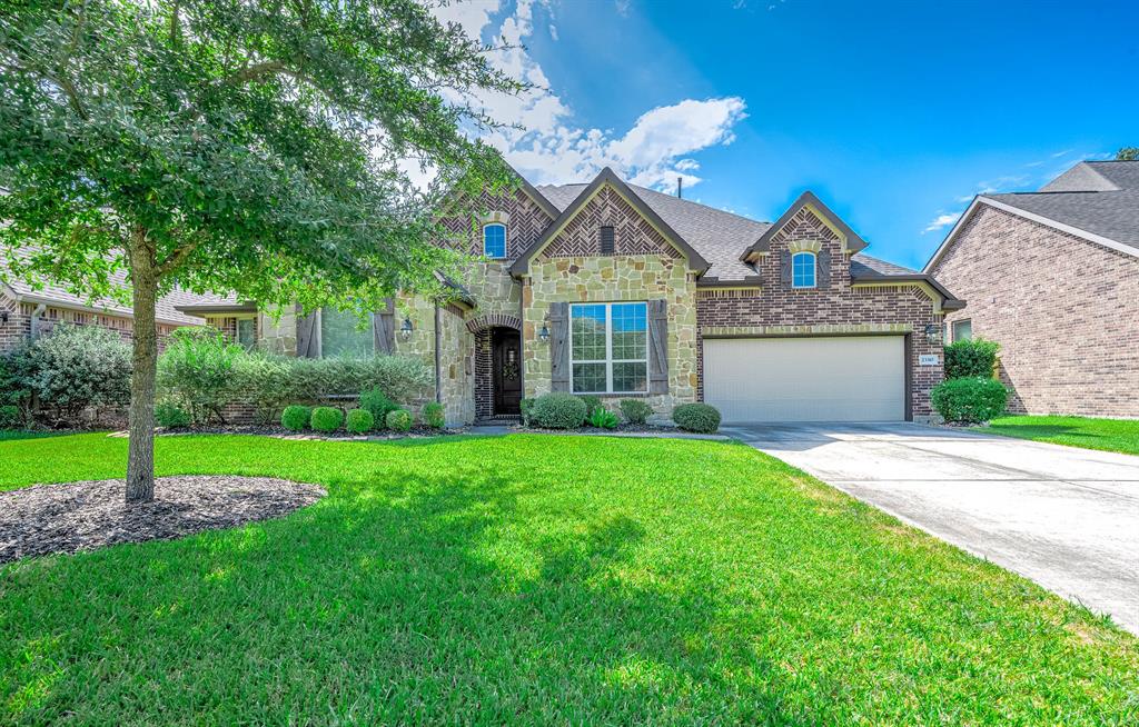 Welcome to this beautiful stone, brick home in a cul-de-sac.