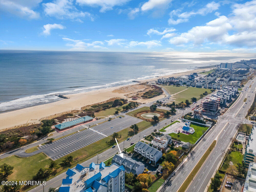 a view of a city and ocean