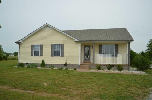 a front view of house with yard