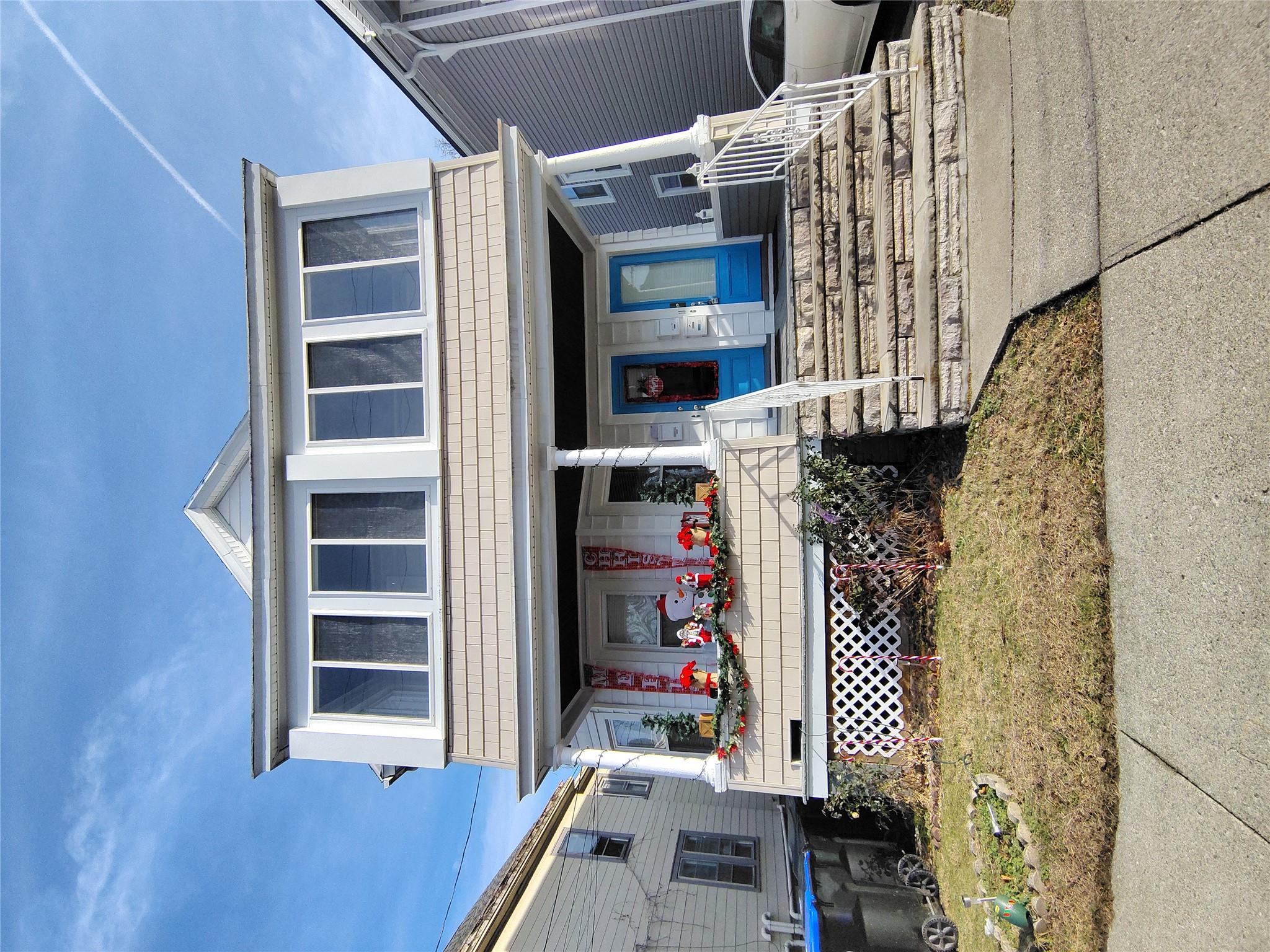 View of front of house featuring covered porch