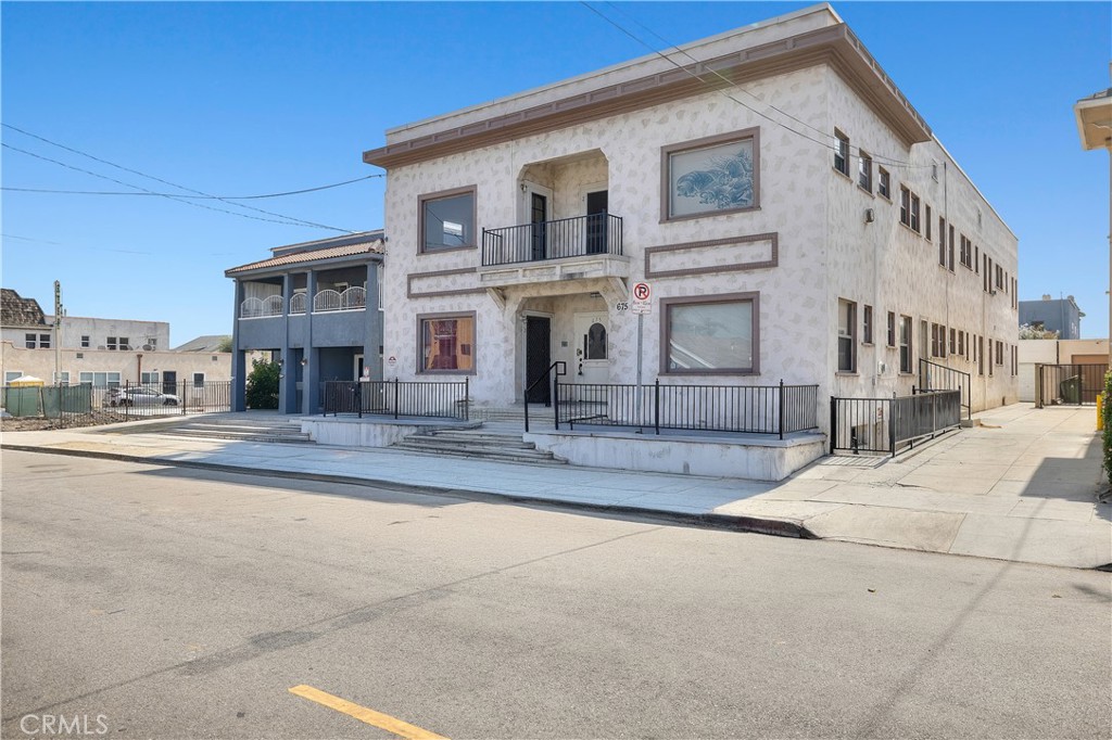 a view of a building with a street