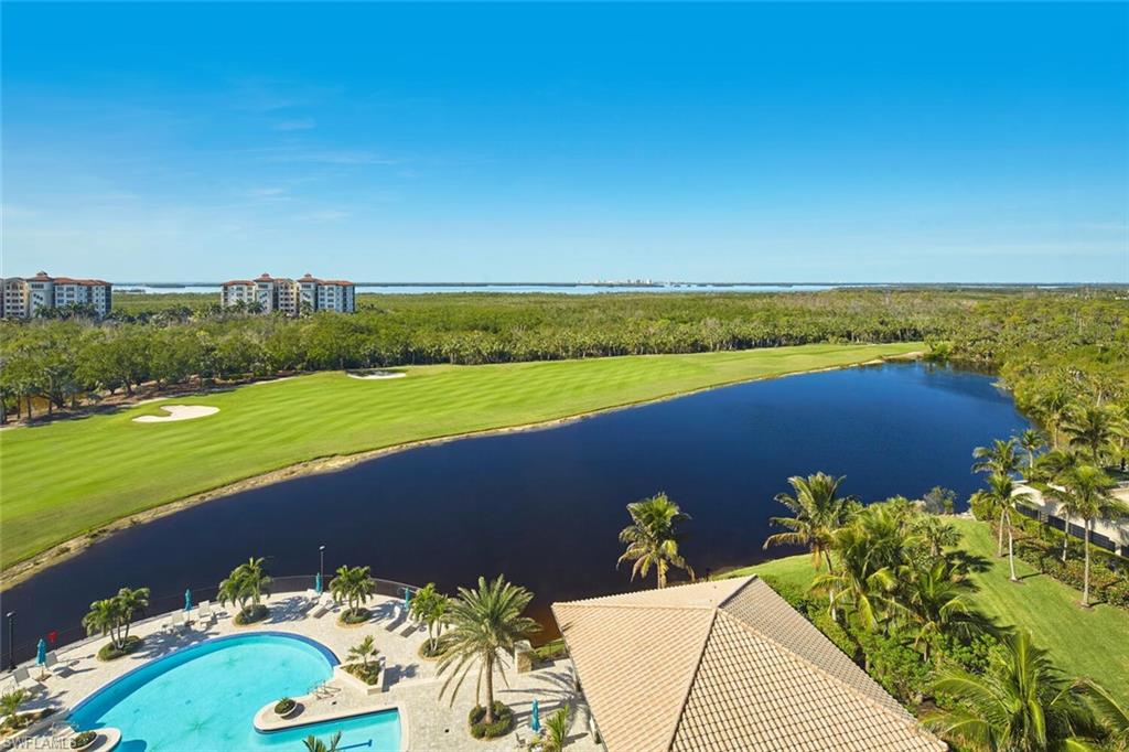 a view of a lake with a yard