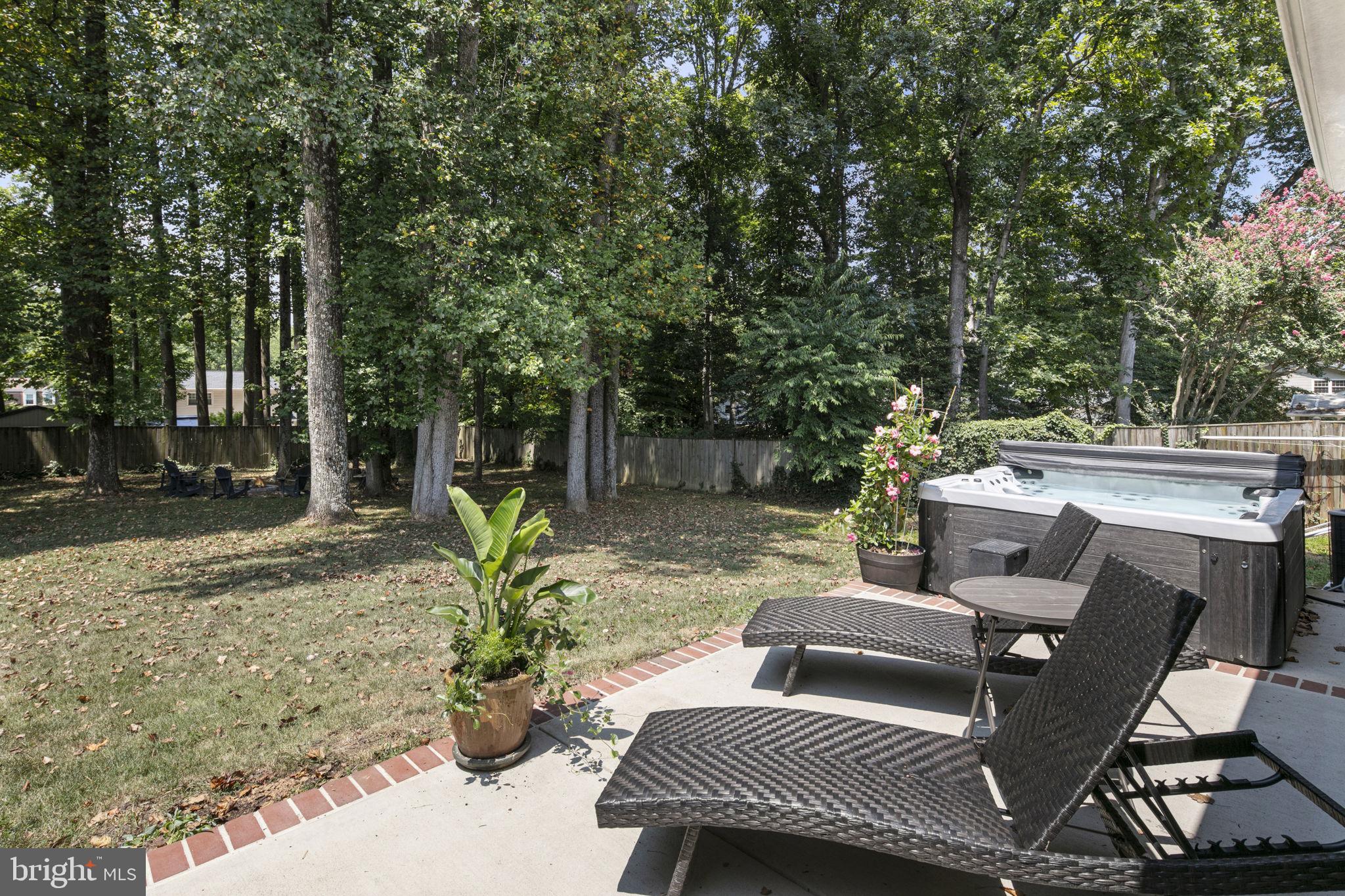 a view of a table and chairs in the patio