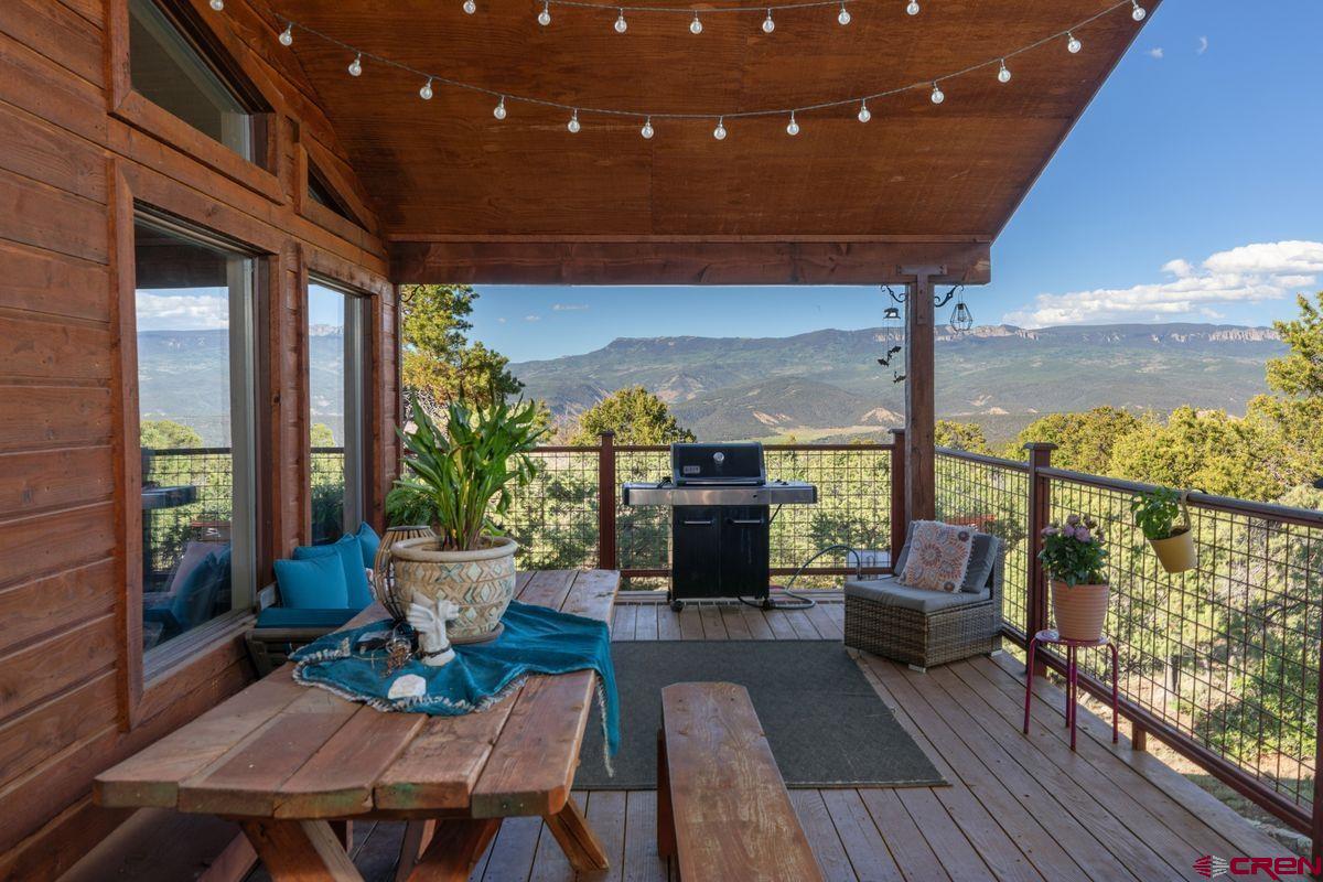 a outdoor living space with furniture and garden view