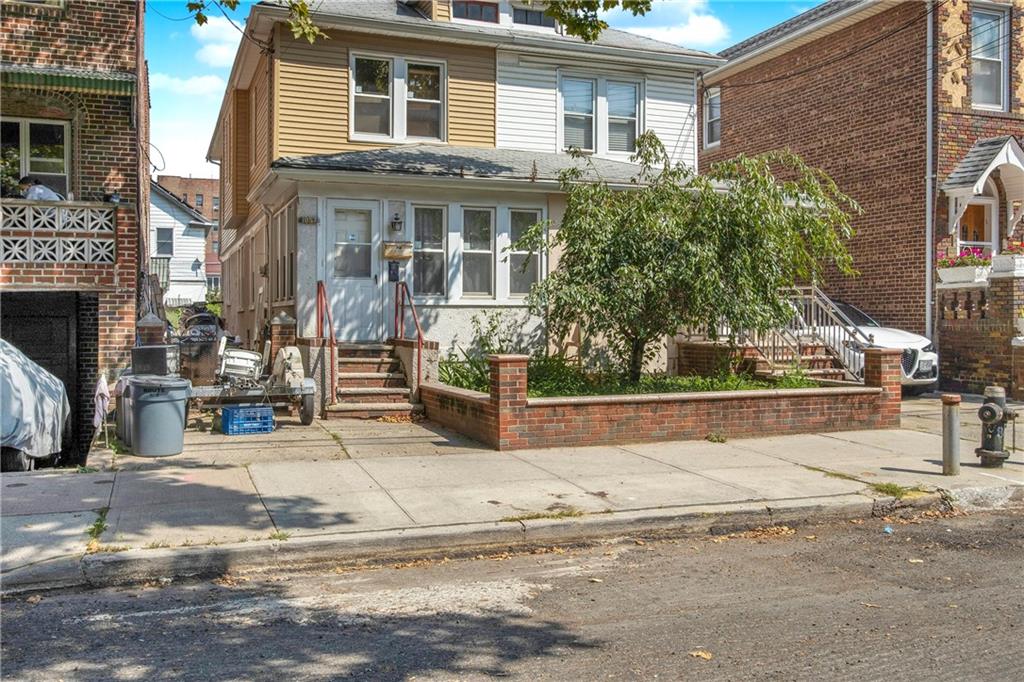 a view of a house with a street