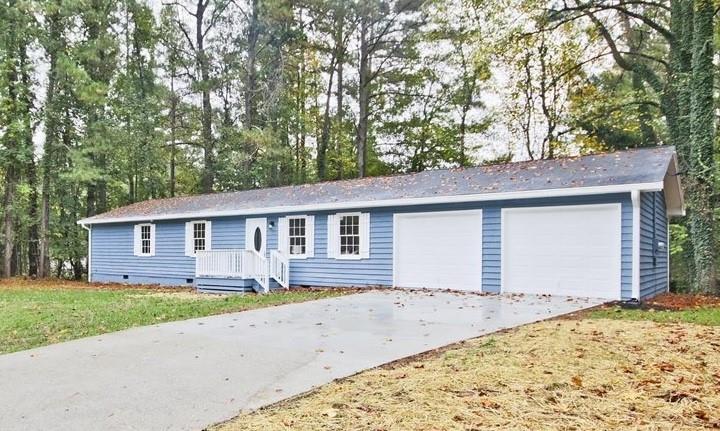 front view of house with a yard