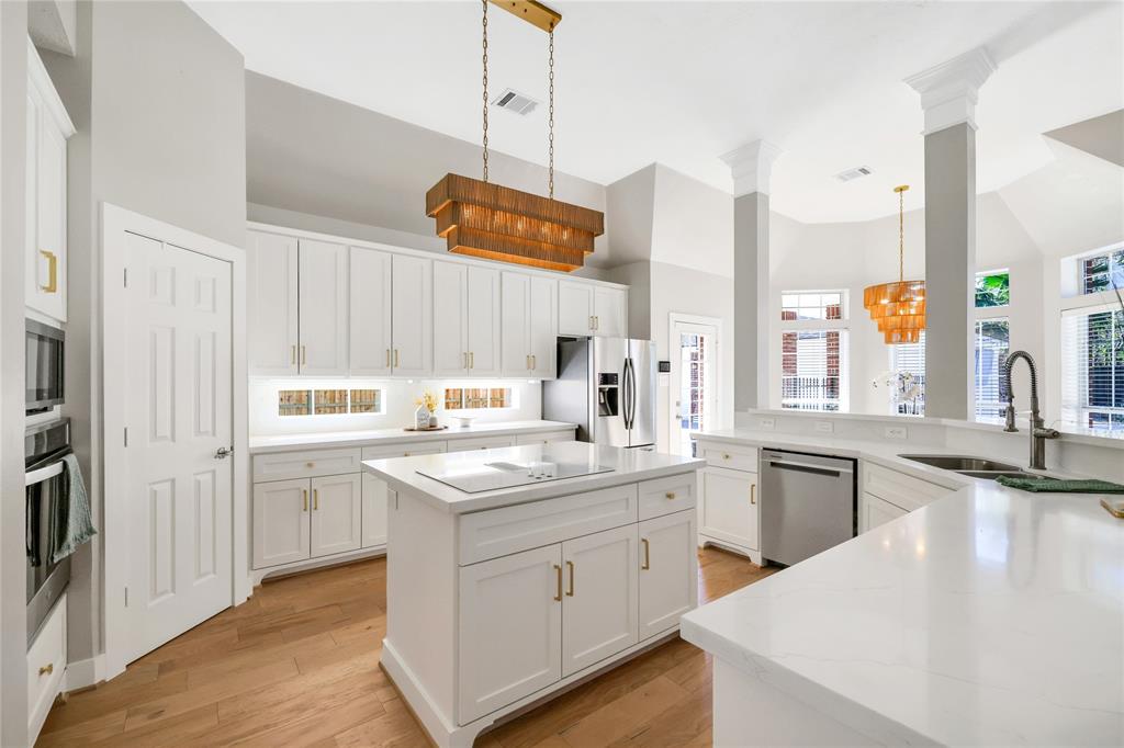 Modern kitchen with quartz countertops, soft-close cabinets, and a custom butler’s pantry.