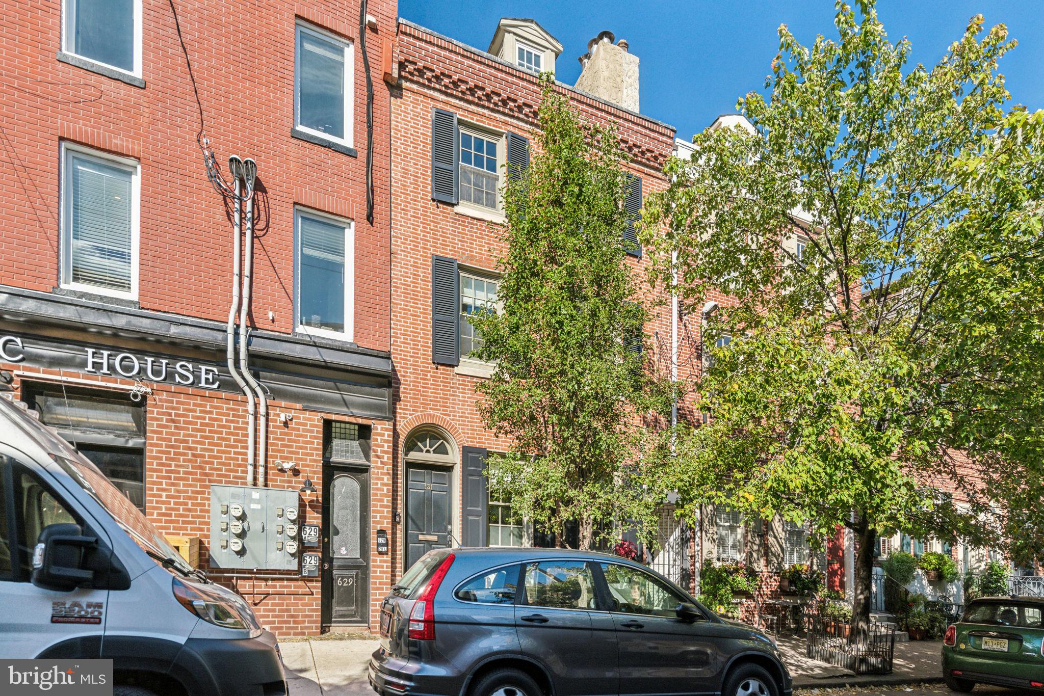 a view of cars parked in front of a building