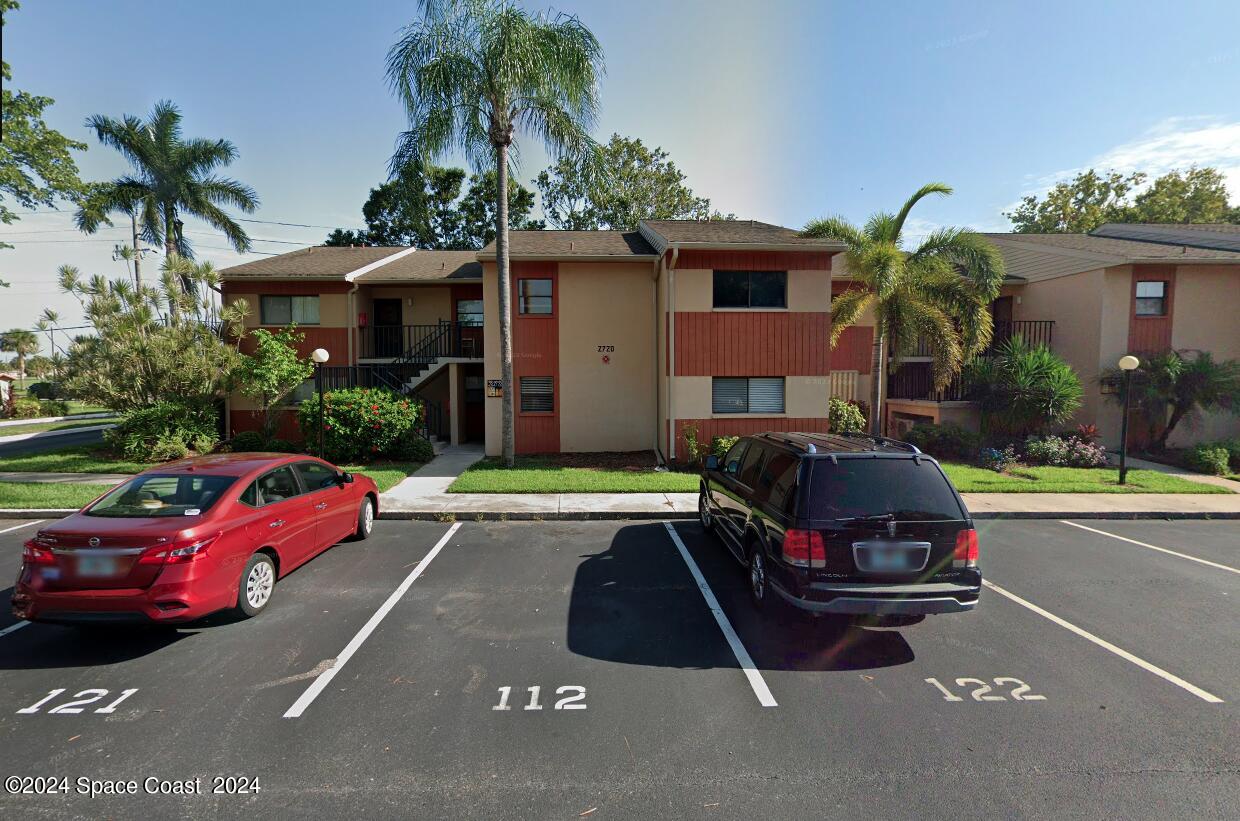 a front view of a house with swimming pool