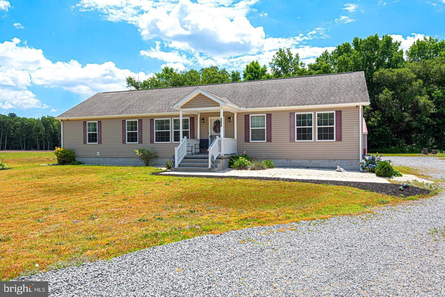 a front view of house with yard and outdoor space