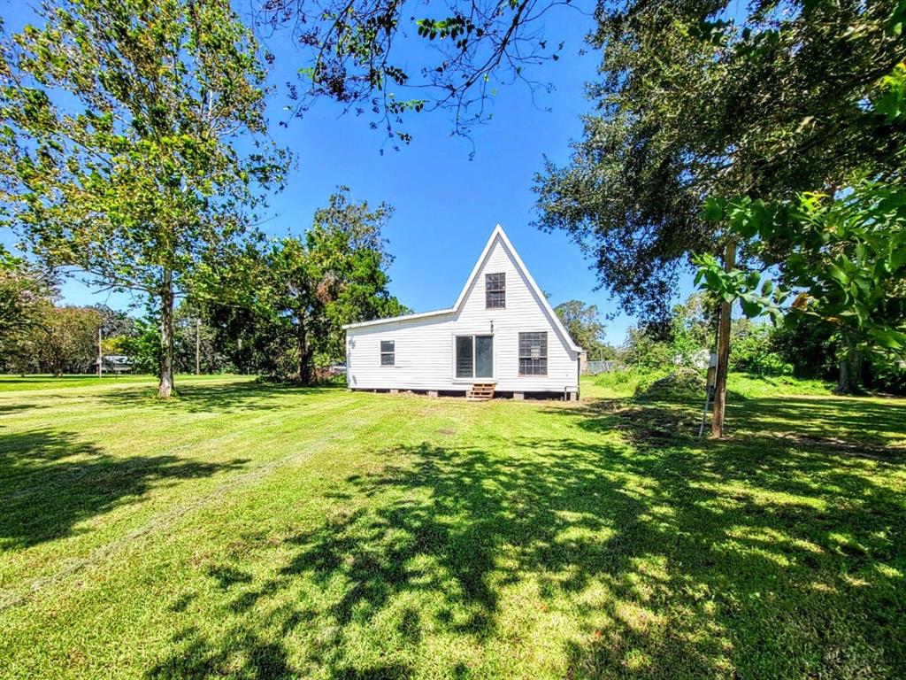 Welcome to 4520 CR 929C situated on just over half an acre and across the street from the San Bernard River