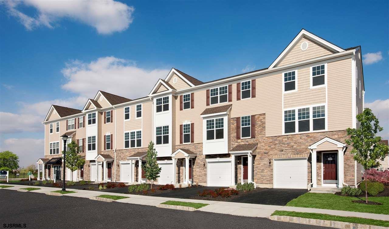 a front view of a large residential apartment building