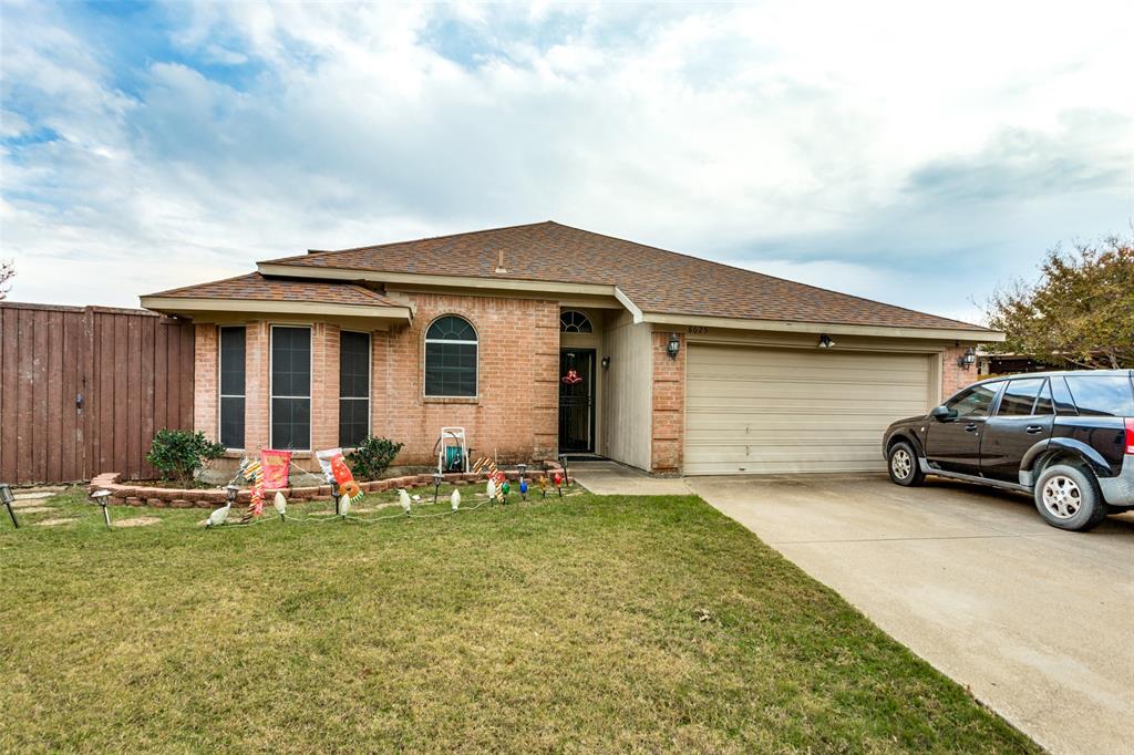 a front view of a house with outdoor space