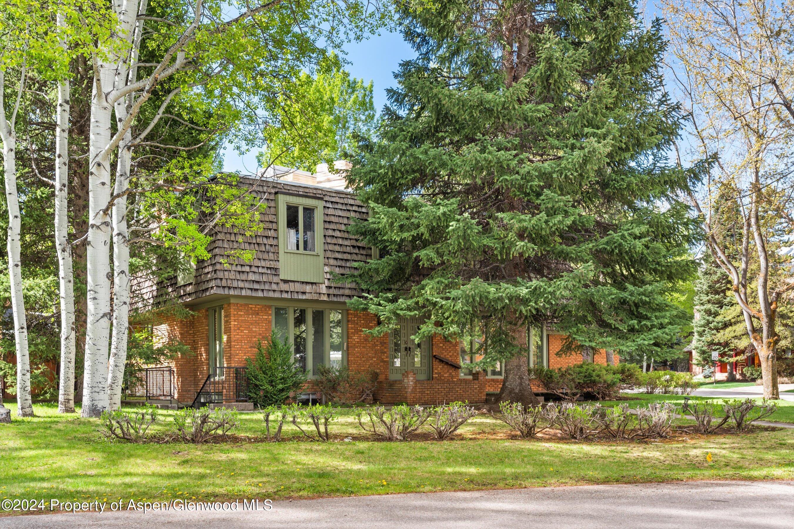 front view of house with a yard