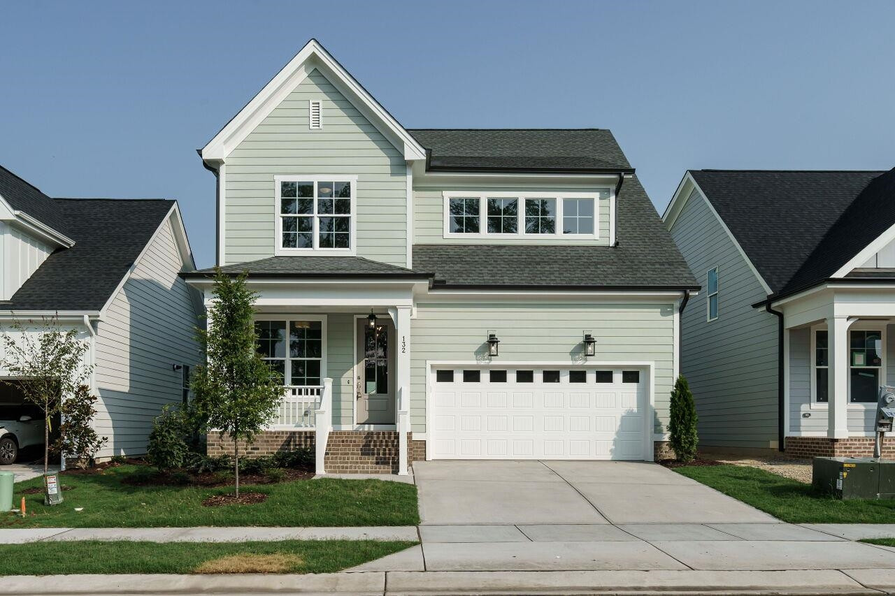 a front view of house with yard