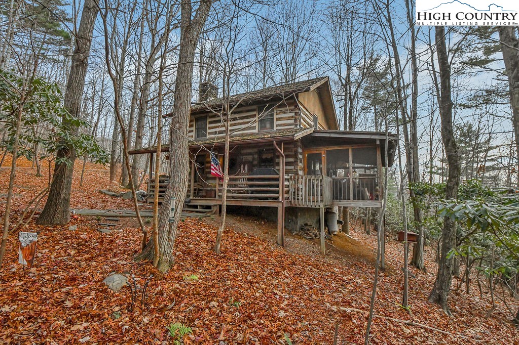 a house with a trees back yard