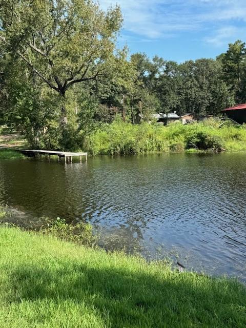 a view of a lake with houses in outdoor space