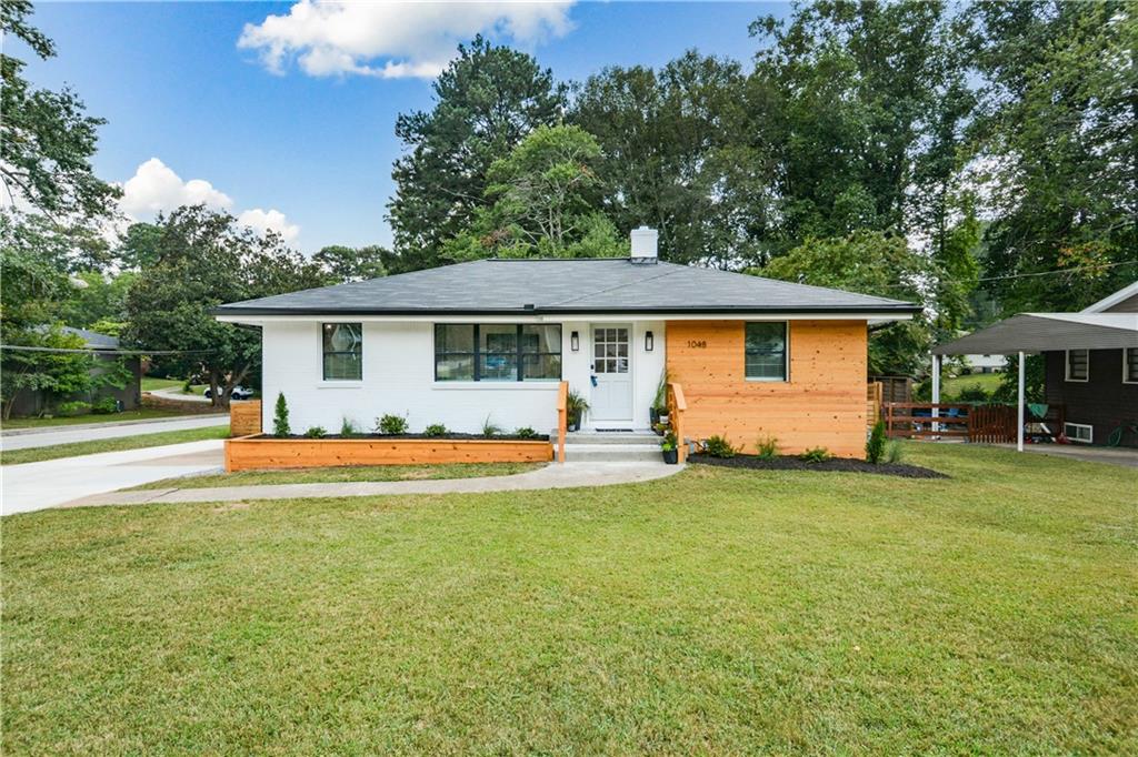 front view of a house with a patio