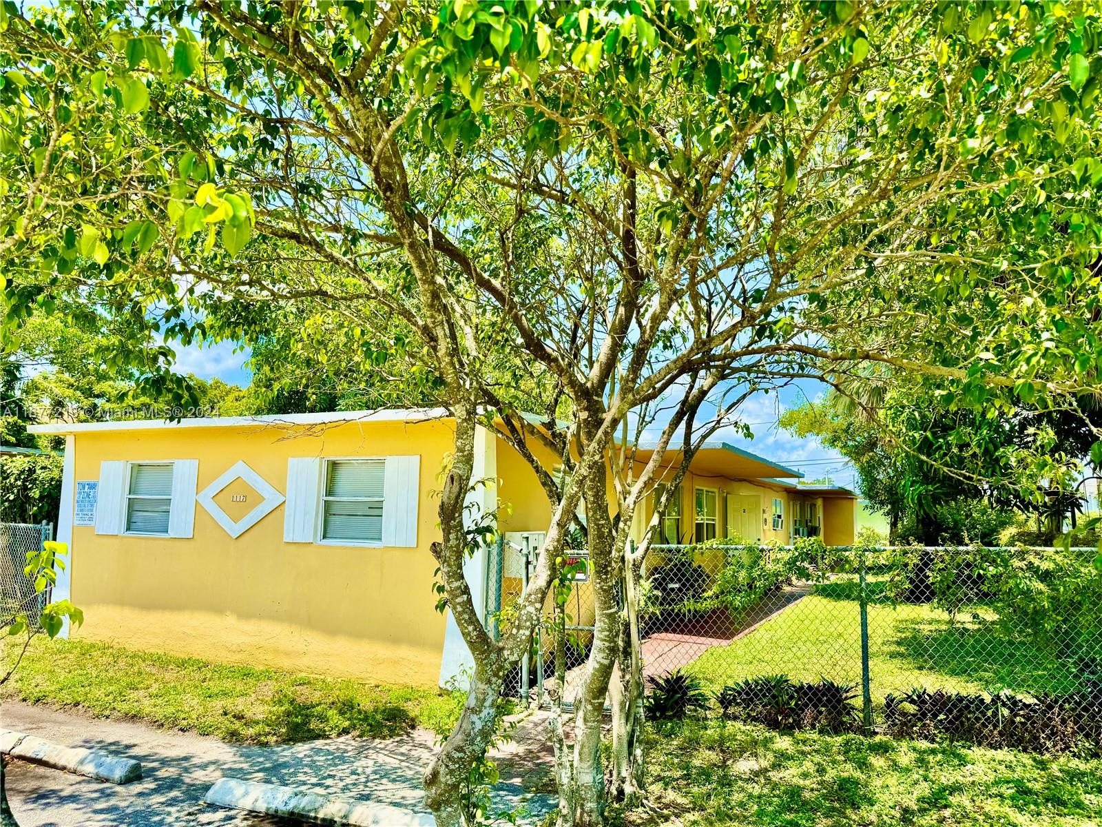 a view of an house with backyard space