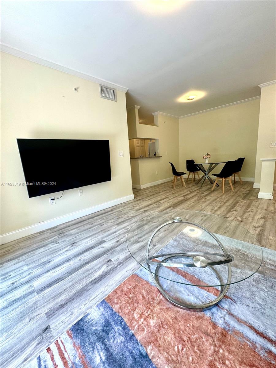 a view of a living room and a fireplace