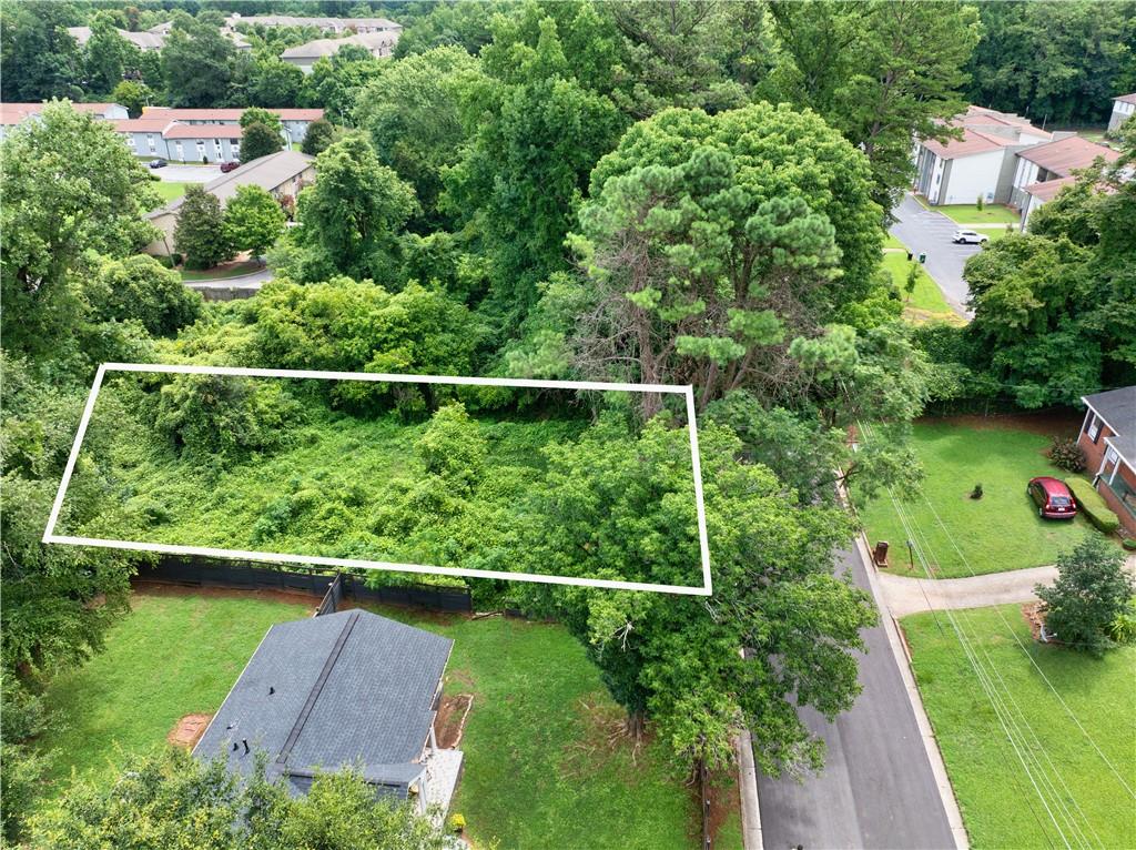 an aerial view of a house with a garden